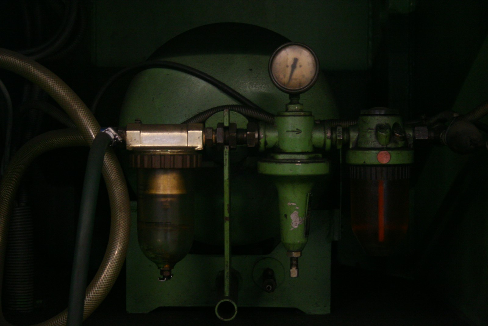 Real compressed air filter, regulator, and gauge assembly in industrial equipment